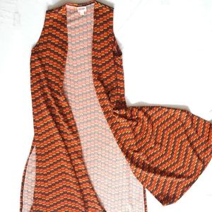 Beautiful colors in this Small Lularoe Joy vest.